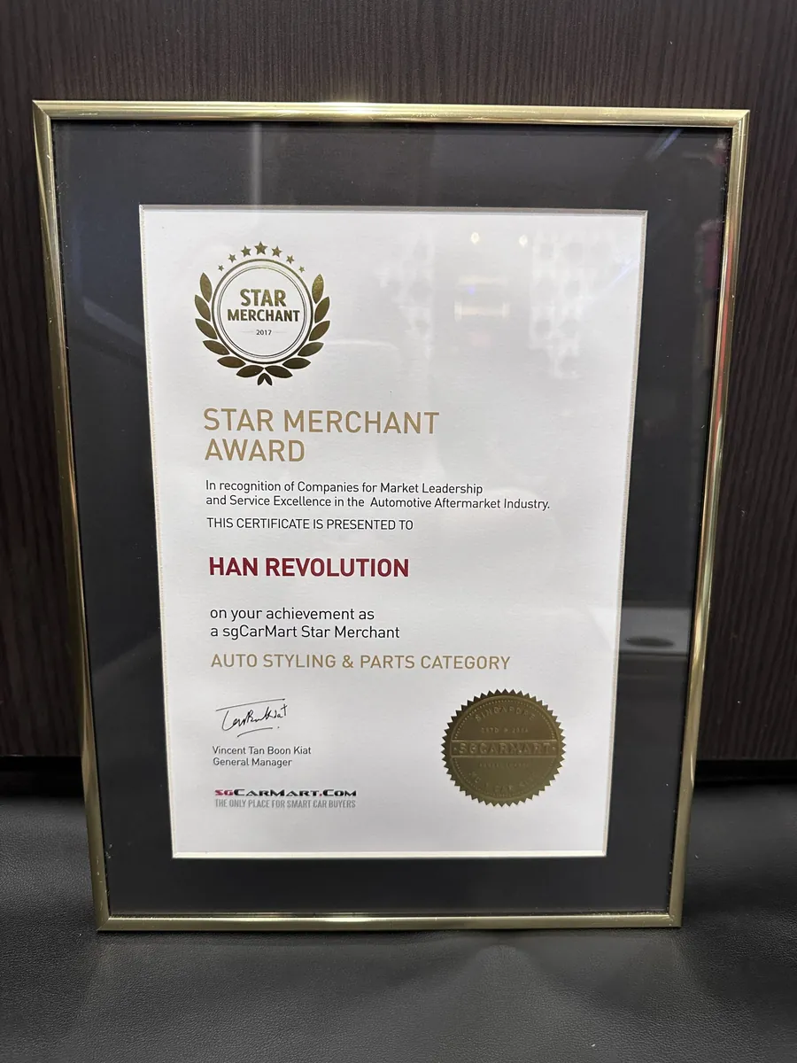 Framed sgCarMart Star Merchant award certificate, auto styling category