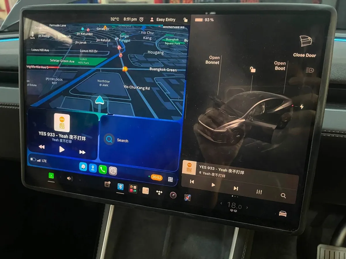 Apple CarPlay maps running inside the original Tesla interface via the ETHOS wireless module